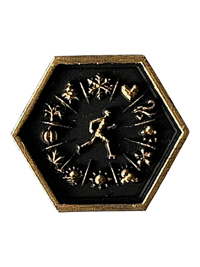 YEAR ROUND token representing Traditions & Challenges